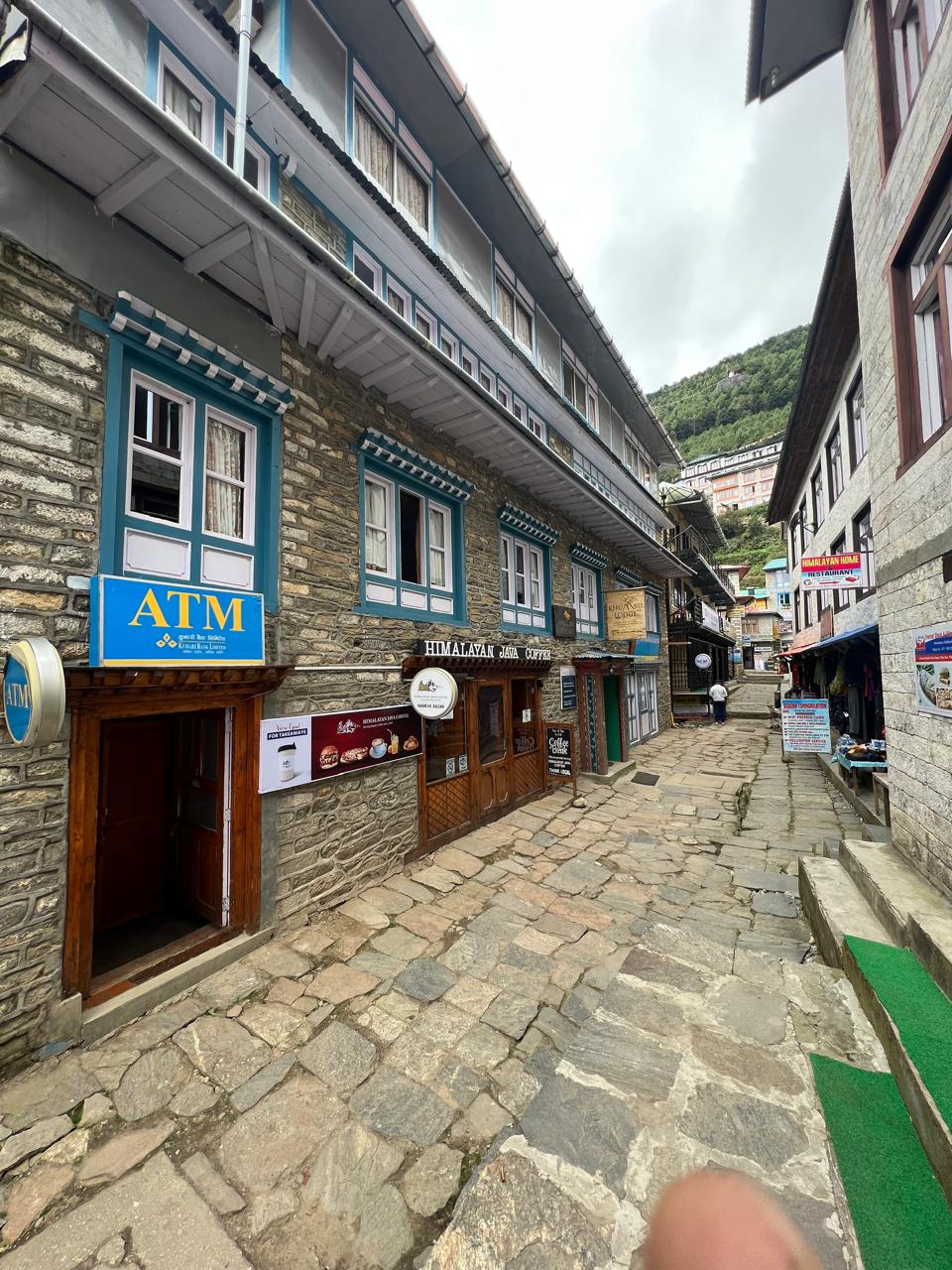 The stone-paved lane running past the lodge in Namche Bazaar